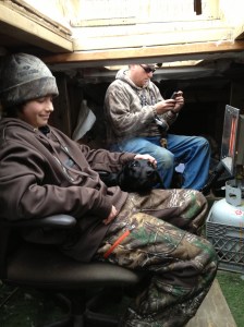 Making friends in the duck blind. Good dog, Lad! 