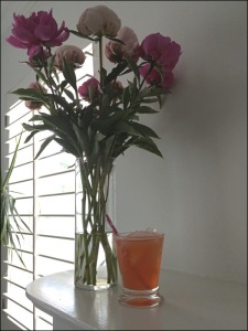Nothing says "Spring" quite like peonies and rhubarb-strawberry cocktails. 