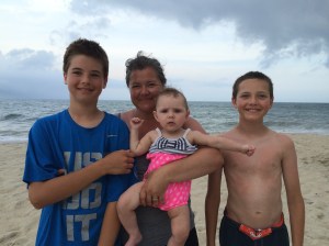Beach hair don't care. The boys and I with my cutie-patootie niece visiting from Kentucky. She looks very fierce in this photo - probably watching for sharks. 